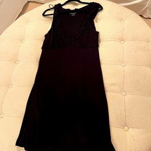 Cynthia Rowley black sleeveless dress with ruffled v neckline and bottom